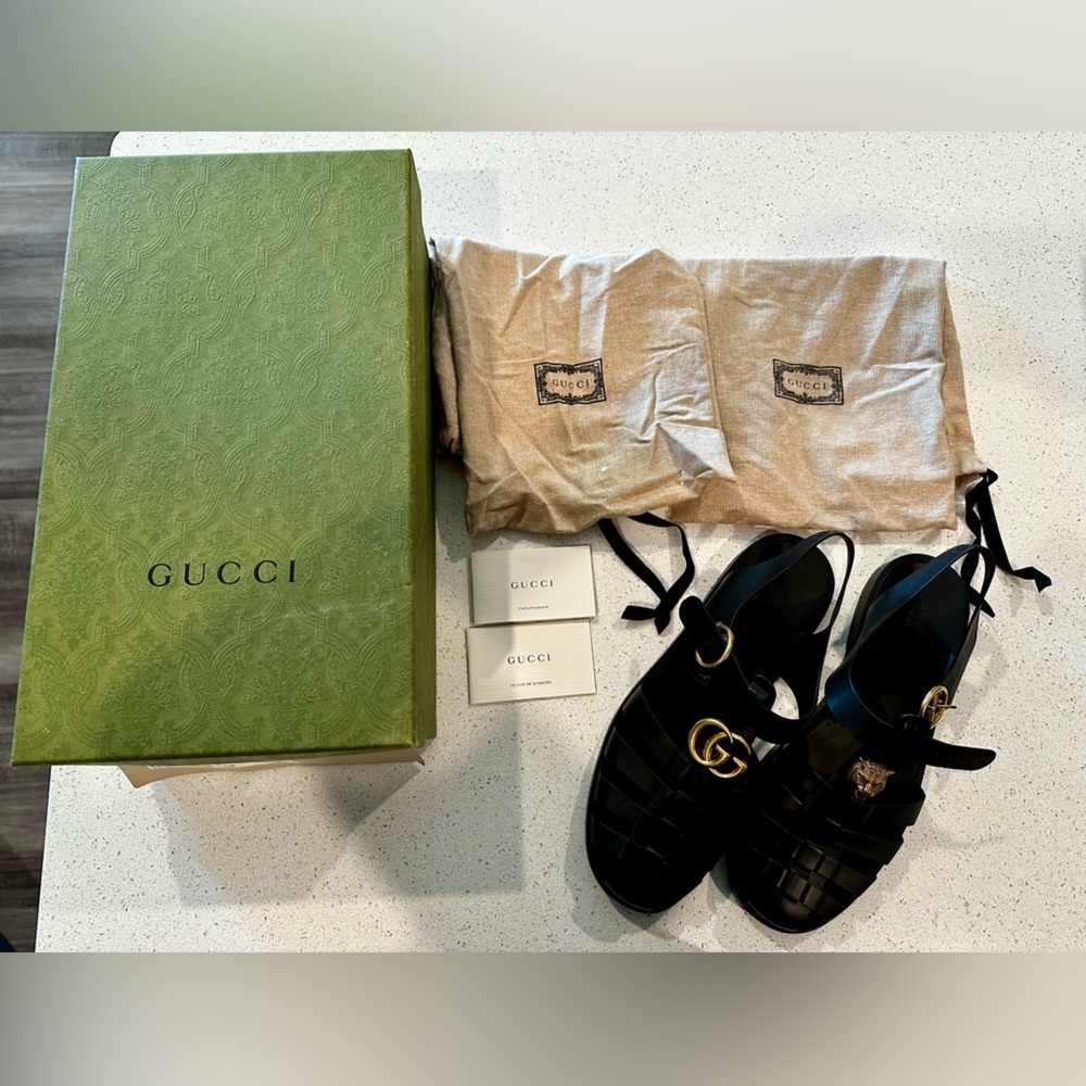 Gucci Black Leather Sandals with Gold Accents